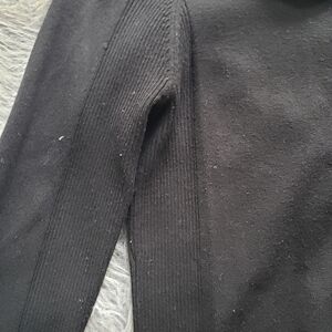 Black turtel neck sweater,  size S, polyester.